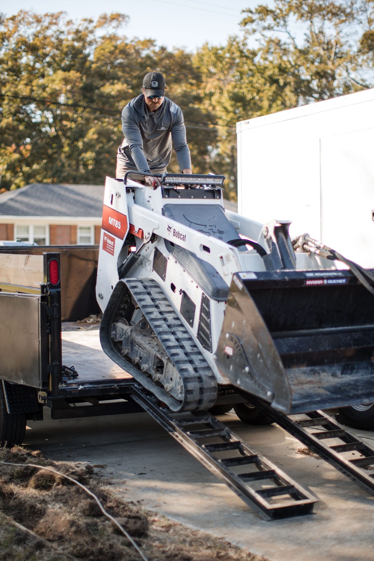 Unloading the loader from the trailer